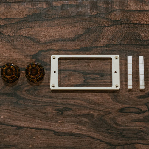 Knobs, pickup rings and nut